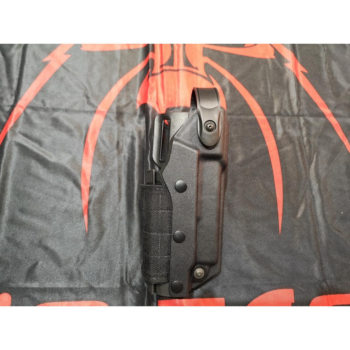 vega holsters kydexowa kabura owb z zabezpieczeniem do pistoletu glock 17 19 latarka vkz804